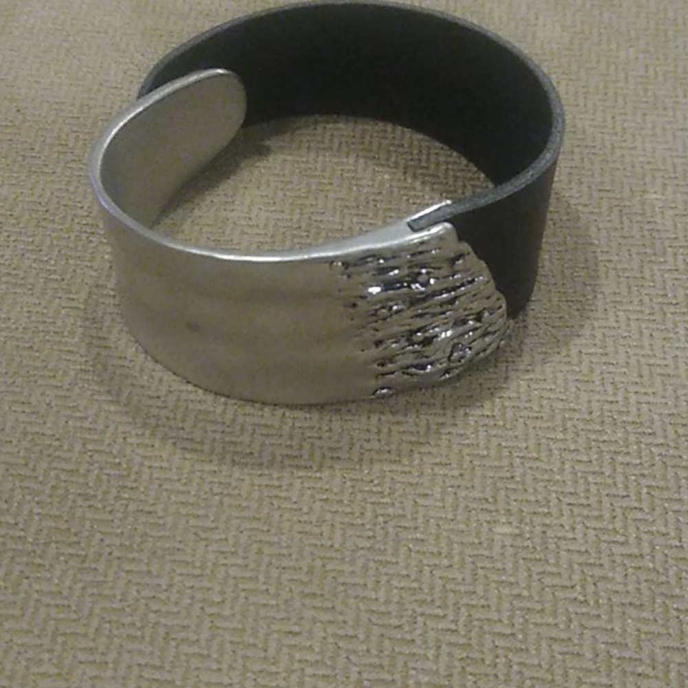 Metal and leather cuff bracelet